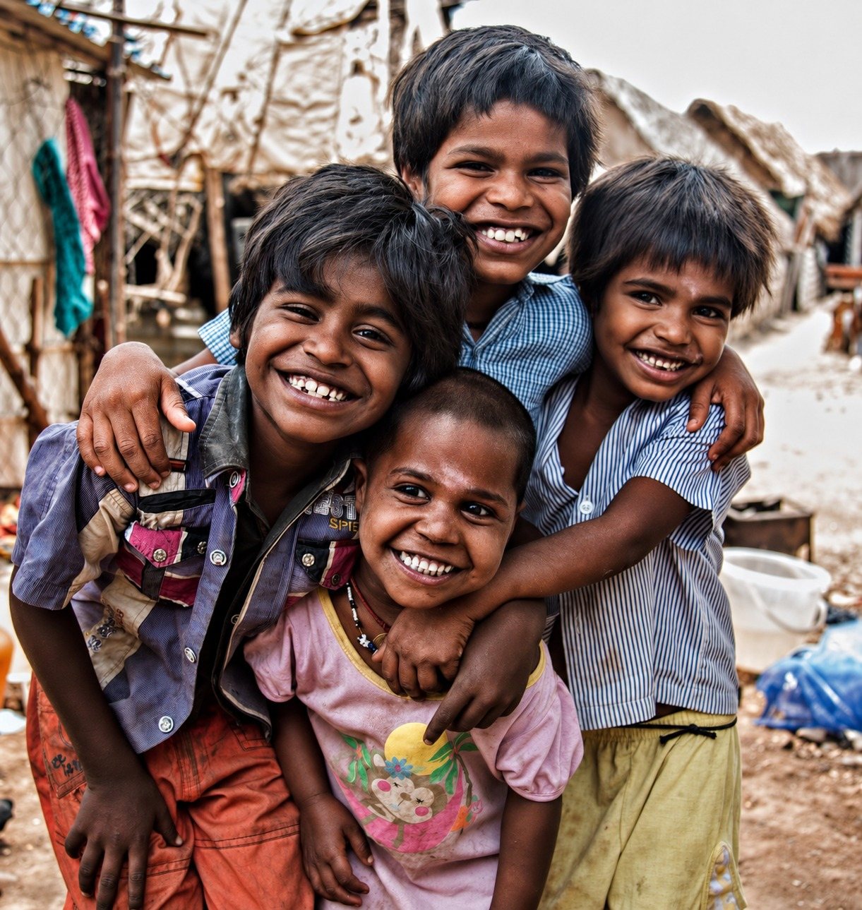 Children smiling together in their neighbourhood
